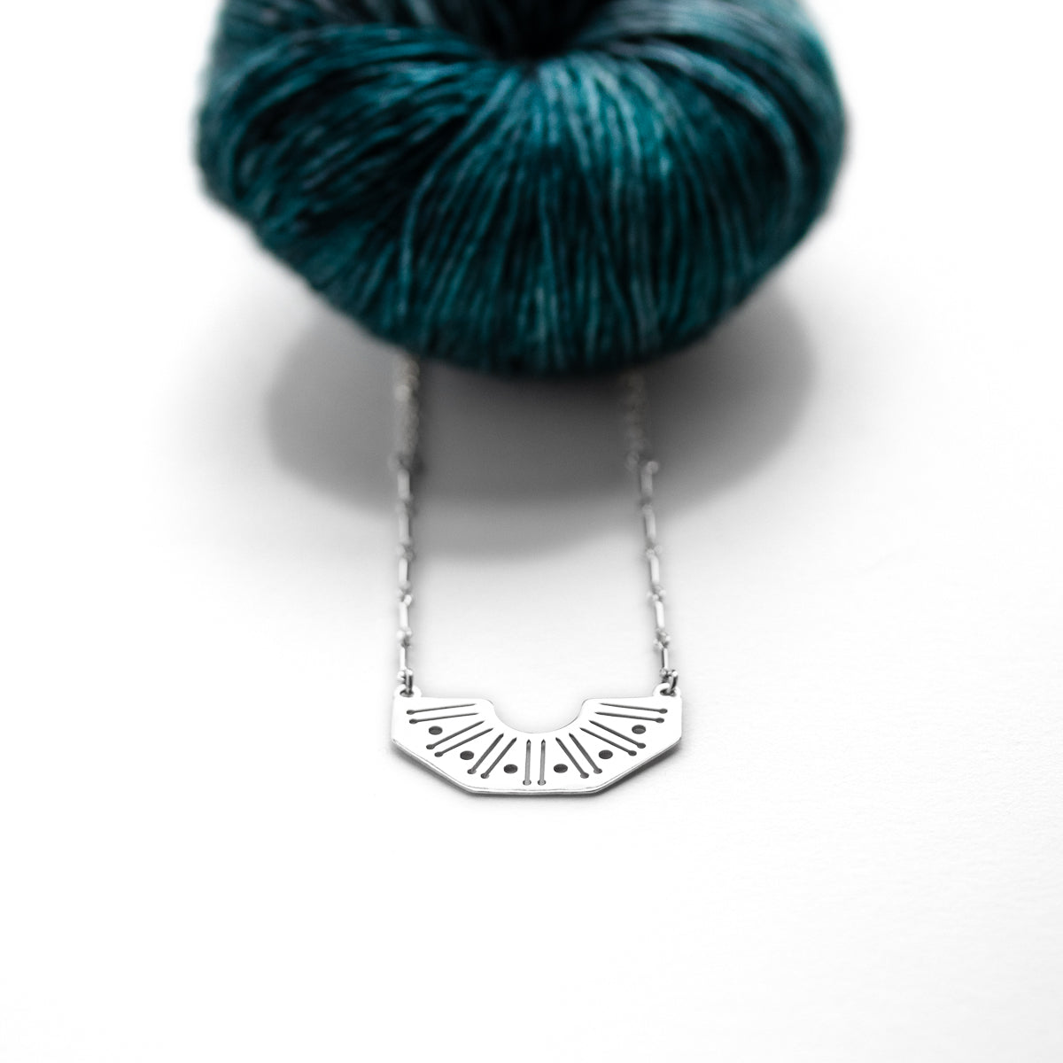 Silver Knitting Needles and Yarn Motif Necklace