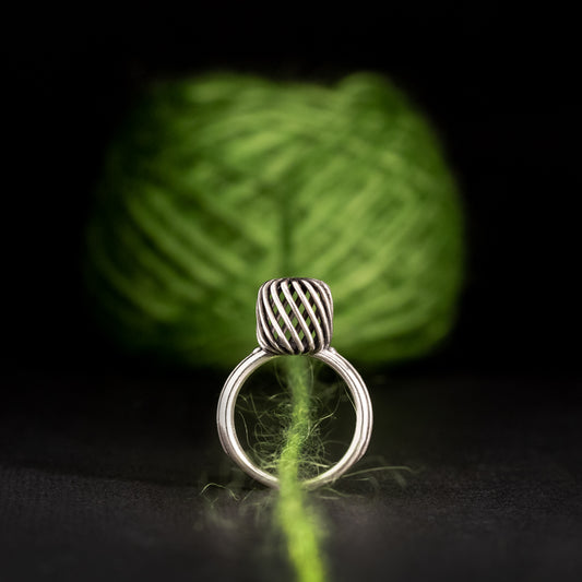 Sterling Silver Yarn Cake Ring With Knitting Needle Motif